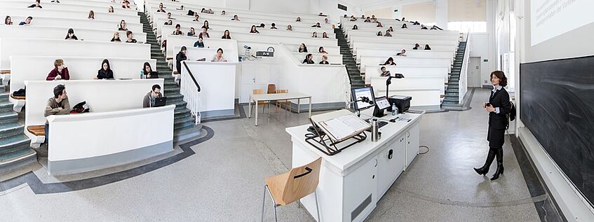 a lecturer teaching in a lecture hall